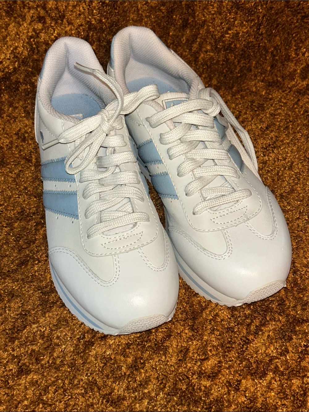 Skechers White Sneakers with Light Blue Stripes